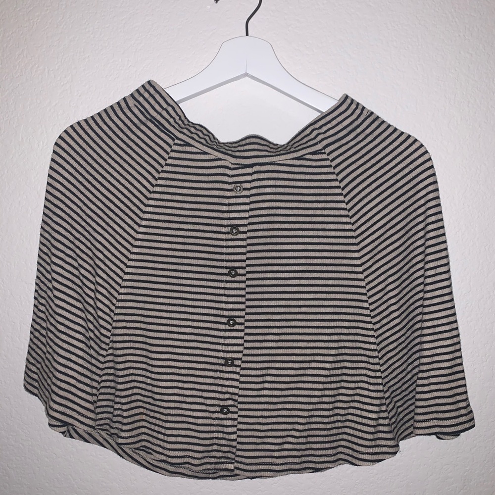 Beige skirt black stripes.